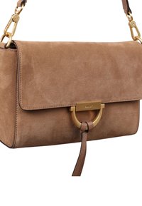 Brown suede handbag with a flap closure, gold hardware, and a circular accent. Features a detachable strap and smooth leather detailing.