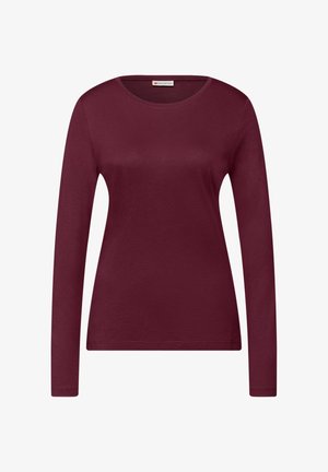 Bordeauxrode lange mouw T-shirt gemaakt van zacht katoen. Heeft een ronde halslijn en een getailleerd silhouet met minimale naden.