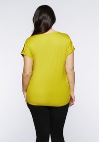 Fiorella Rubino Camicetta - giallo