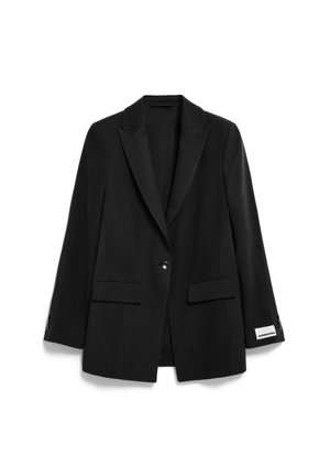 Black single-button blazer with notch lapels, flap pockets, and a white rectangular label on the right sleeve cuff.