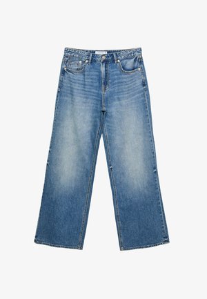 Wide-leg blue denim jeans with a light wash, featuring five pockets, a button closure, and visible stitching along the seams.