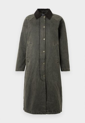 Long olive green denim coat with a black corduroy collar, snap front closure, two side pockets, and a slightly oversized silhouette.