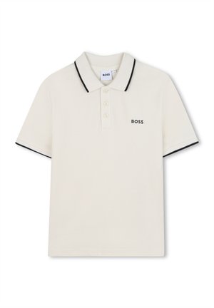 Polo a maniche corte di colore crema con bordatura nera, patta con quattro bottoni e logo "BOSS" ricamato sul petto sinistro. Materiale in cotone.