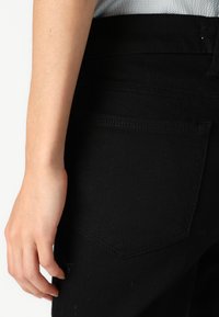 Good American GOOD LEGS - Jeans Skinny Fit - black