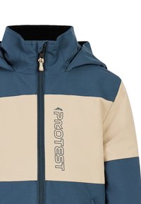 Men's zip-up jacket in blue and beige, featuring a hood, textured fabric, contrasting color blocks, and subtle logo detailing on the chest.