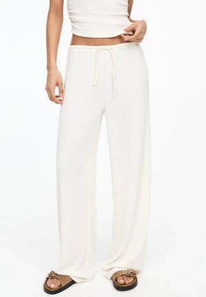 WIDE - Trousers - beige