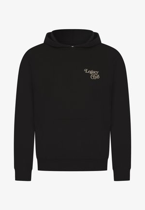 Sweat à capuche noir avec poche avant et texte beige "Legacy Club" imprimé sur le côté gauche supérieur de la poitrine.
