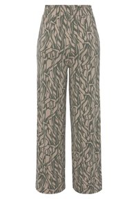 Wide-leg pants with a light beige base and green abstract leaf pattern. Features an elastic waistband and soft, textured fabric.