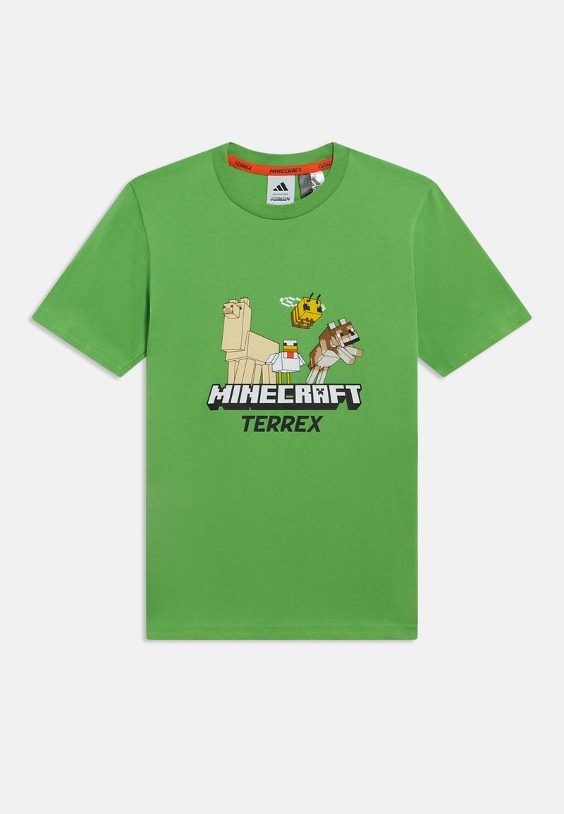 Πράσινο βαμβακερό T-shirt με γραφικό από το Minecraft που απεικονίζει χαρακτήρες ζώων και τη λέξη «TERREX» με έντονη μαύρη γραμματοσειρά. Κοντά μανίκια και στρογγυλή λαιμόκοψη.