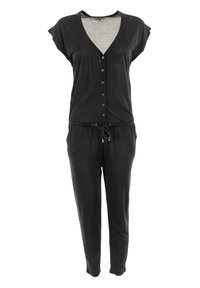 Tuta nera con maniche corte, scollo a V, chiusura frontale con bottoni, vita elasticizzata e dettaglio con cordino. Tessuto morbido e liscio.