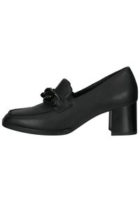 Chaussure à talons en cuir noir avec un bout arrondi, un accent de nœud décoratif sur le dessus et un talon en bloc texturé. Fini lisse.