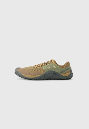 Lightweight athletic shoe in green and brown mesh with textured rubber sole. Features contrasting laces and "Vibram" branding on side.