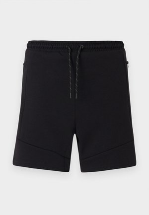 Calções de desporto pretos feitos de tecido suave, com um cós elástico, cordão ajustável e bolsos laterais com fecho éclair e costuras reforçadas.