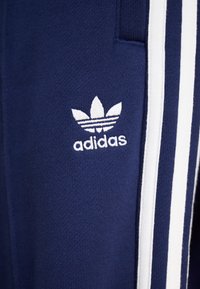 adidas Originals PANT - Spodnji deli trenirk - night indigo