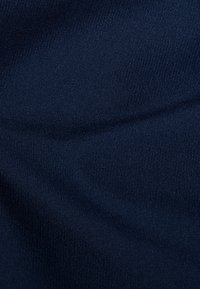 Navy blue fabric with a smooth texture and subtle diagonal pattern. The material appears to be woven and slightly lustrous.