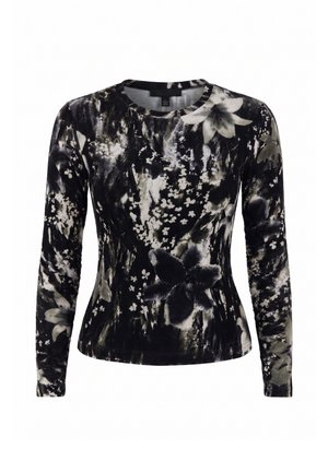 Top nero e grigio a maniche lunghe con motivi floreali e fogliari astratti, scollo rotondo e linea aderente.