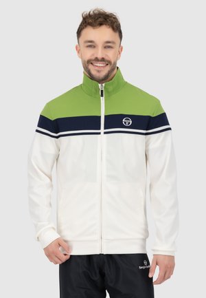 Witte zip-up jas met een groene bovensectie, marineblauwe streep en witte accenten. Gemaakt van gladde stof met een hoge kraag.