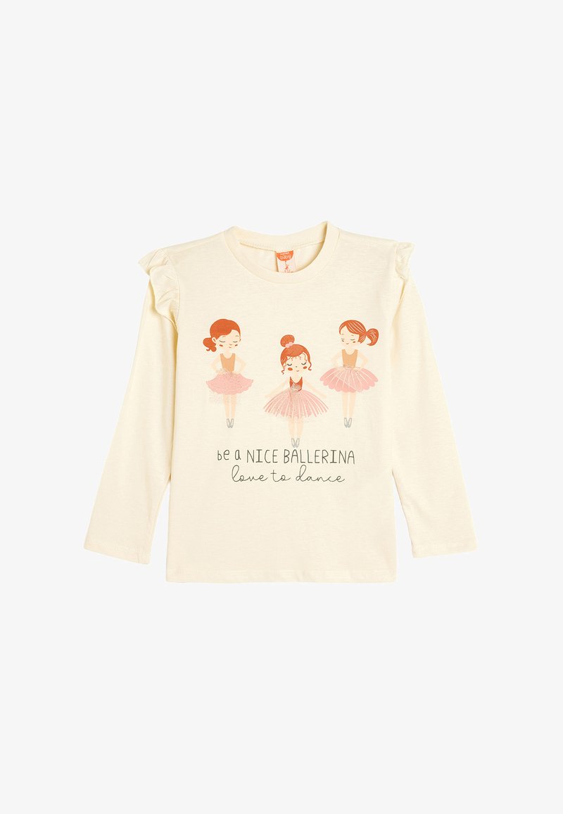 Long-sleeve cream t-shirt with ruffled shoulders featuring three illustrated ballerinas and text reading "be a nice ballerina love to dance."