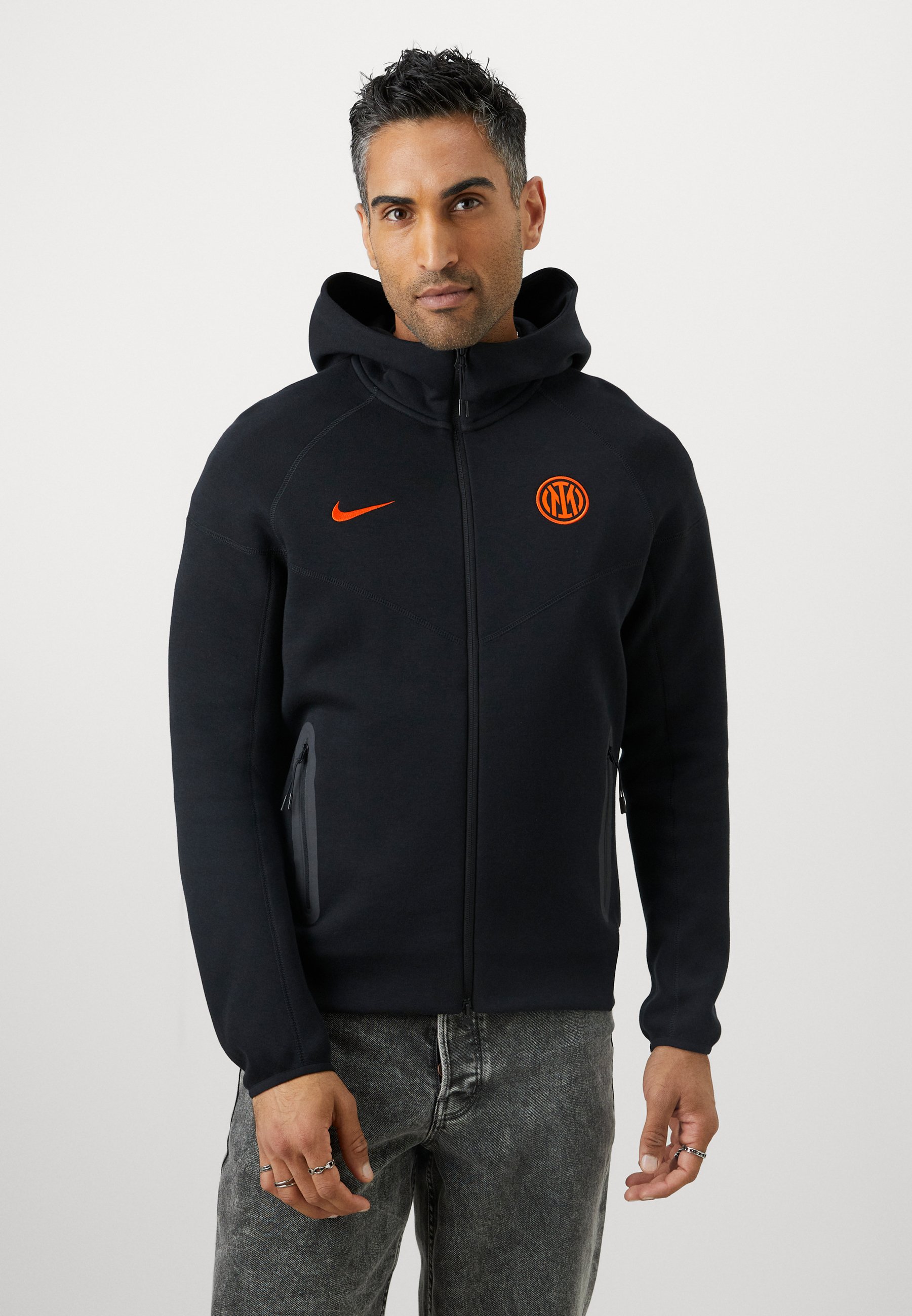 orange and black nike sweatsuit