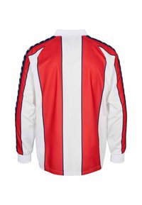 Veste de sport à manches longues avec des rayures verticales rouges et blanches et un ruban bleu marine avec des logos sur les manches, vue de dos.