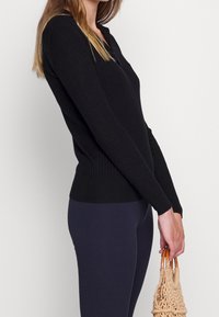 Marks & Spencer Sweter