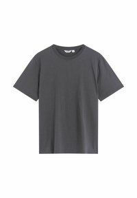 Grå t-shirt lavet af blødt bomuld, med en klassisk rund hals, korte ærmer og en afslappet pasform uden synlige mønstre eller detaljer.