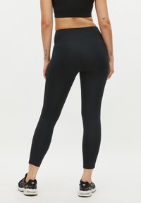Röhnisch KAY HIGH WAIST T - Leggings - black black