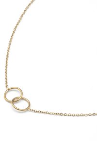 Gullring med to sammenflettede ringer langs en delikat kjede, med en glatt metalloverflate og oval lenkedesign.