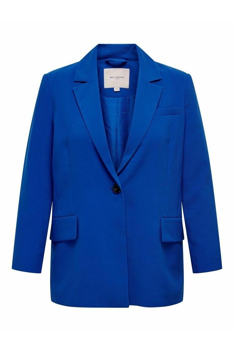 Blazer azul a medida hecho de una tela suave. Presenta un cierre de un solo botón, solapas con muesca y dos bolsillos frontales. Corte relajado con mangas largas.