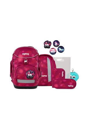 Magenta Ergobag backpack set with matching pencil case, small bag, four unicorn pins, and a fluffy blue keychain with googly eyes.
