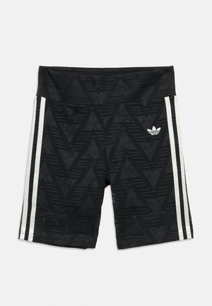 Fekete sport rövidnadrág finom cikk-cakk mintával, fehér oldalsávokkal és egy kis fehér Adidas trefoil logóval a bal combon.