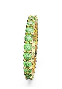 Gold ring set with round, sparkling green gemstones arranged in a continuous band, showcasing a smooth and polished finish.