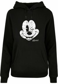 Černá mikina s kapucí, která má na přední straně velký, opotřebovaný bílý grafický vzor Mickey Mouse a klokaní kapsu. Součástí jsou také stahovací šňůrky na kapuci.