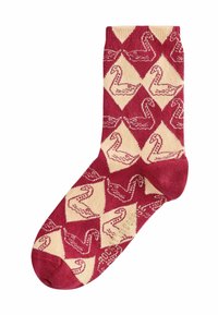Calcetín de color marrón y crema con un diseño de diamantes que presenta motivos de cisnes, confeccionado en tela de punto con una textura suave.
