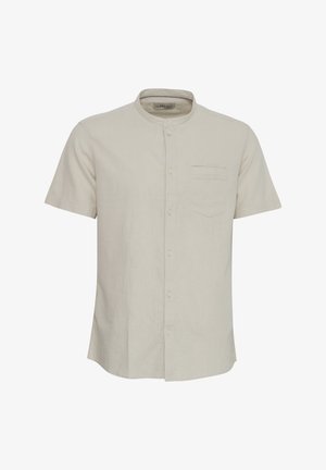Short-sleeve, button-up shirt in light beige linen. Features a band collar, a chest pocket, and a straight hem. Smooth texture.