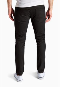 Next SUPER SKINNY - Testhezálló fazon - black