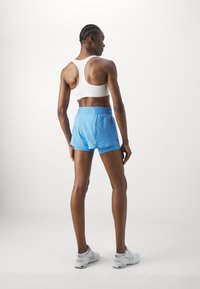 Nike Performance Šortky 2 v 1 - university blue/reflective silver-coloured