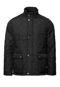Giacca nera trapuntata con colletto alto, bottoni a scatto, due tasche frontali con patta e tessuto testurizzato. Presenta cuciture a motivo romboidale su tutta la superficie.