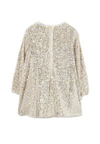 Top in paillettes dorées con maniche lunghe, scollatura rotonda e zip centrale. Presenta una vestibilità ampia e una texture scintillante in tutto.