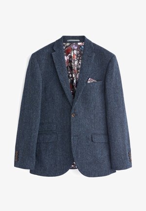 Blazer in tweed blu a spina di pesce con due tasche frontali e chiusura con un bottone. Foderato con un motivo floreale. Fazzoletto da taschino incluso.