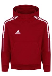 Rød hættetrøje med høj krave, hvide sidelister, forlommer og broderet logo. Fremstillet af blødt stof med ribstrikkede manchetter.