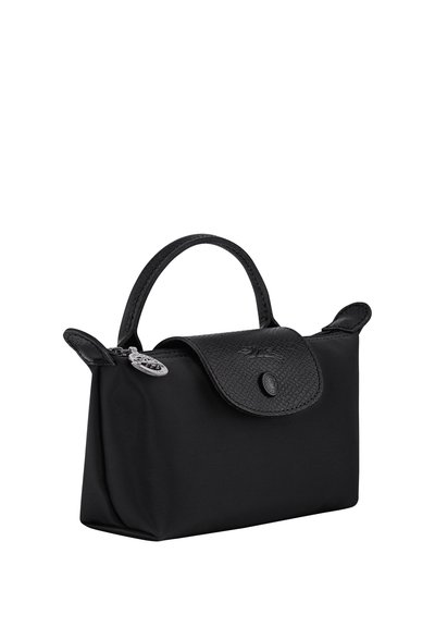 Small black handbag with a single top handle, textured flap secured by a button, and a silver zipper pull charm.