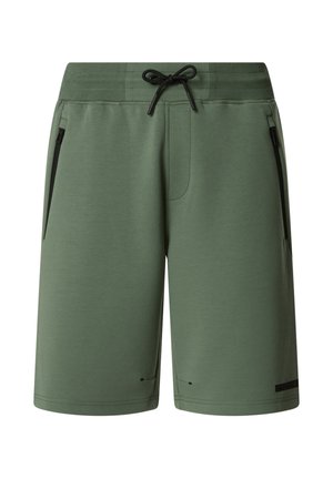 Grüne Shorts knielang mit schwarzen, mit Reißverschluss verschließbaren Seitentaschen und einem schwarzen Kordelzugbund.