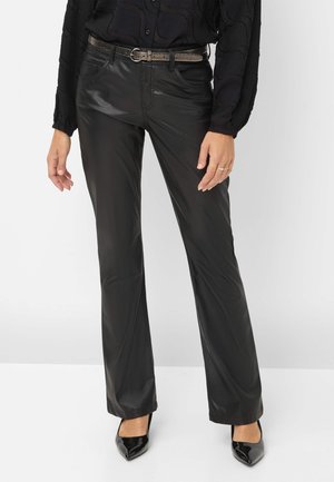 STYLE SHAKIRA - Trousers - black