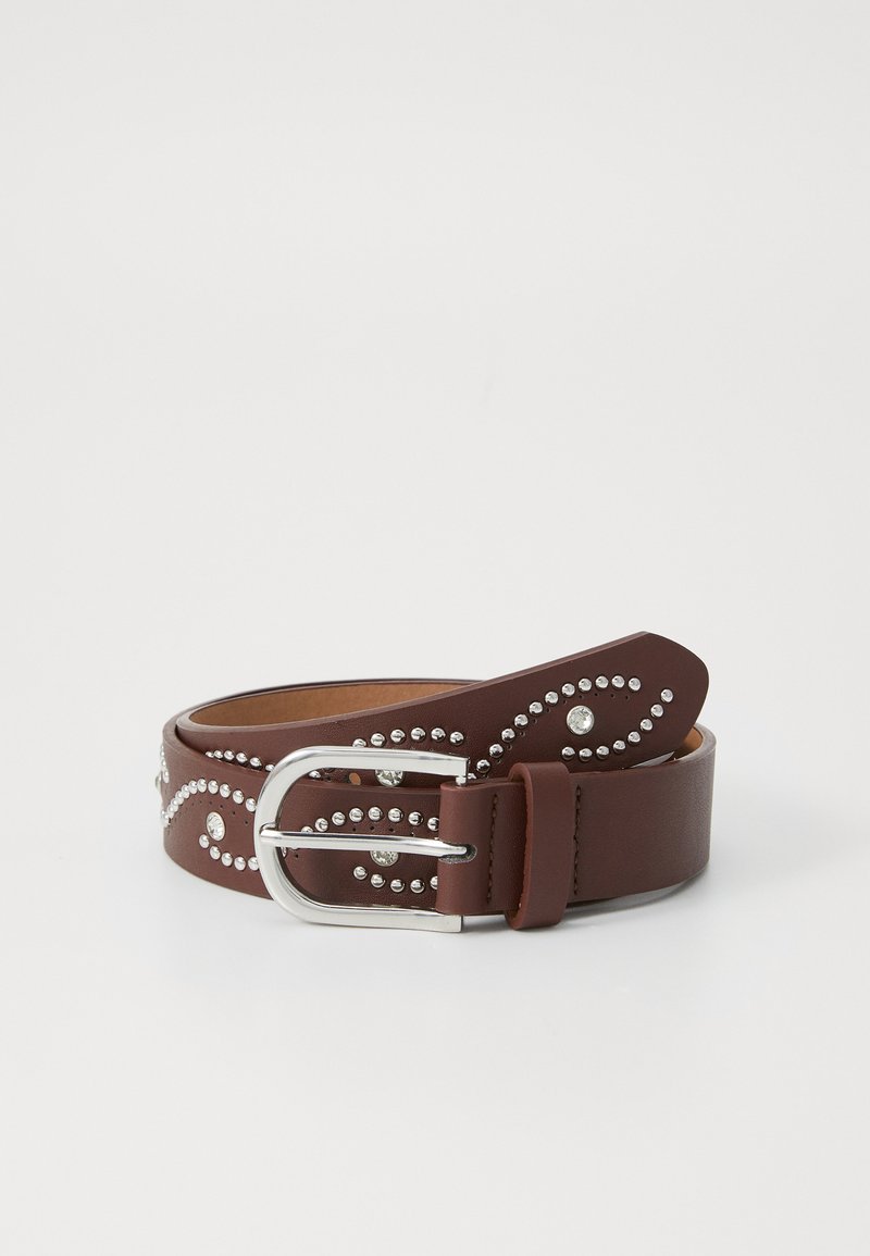 Brown leather belt featuring silver studs in a wavy pattern, with a shiny metal buckle. Textured finish complements the design.