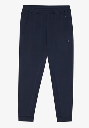 Námořnické sportovní kalhoty vyrobené z měkké, elastické látky. Mají elastický pás, dvě boční kapsy a zúžené manžety. Jemný detail loga.