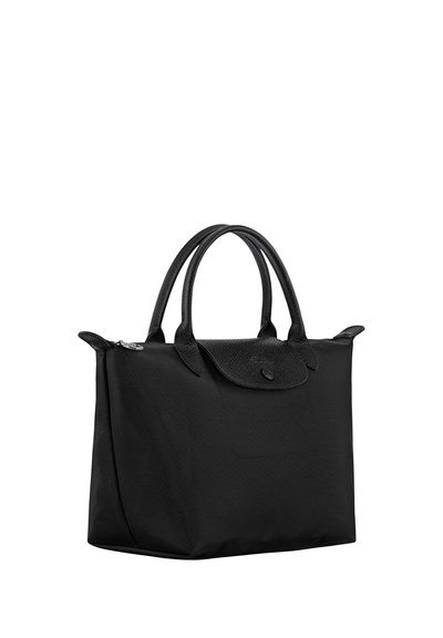 Black rectangular handbag with double rounded handles, flap closure with button, and zipper on top, made of mixed fabric and leather.