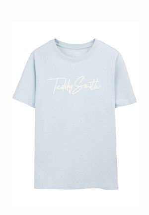 T-shirt manches courtes bleu clair avec logo en script blanc "Teddy Smith" centré sur la poitrine, col rond et coupe régulière.