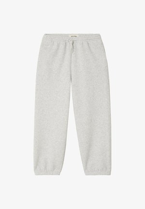 Hellgraue Jogginghose mit elastischem Bund, Tunnelzug, Seitentaschen und elastischen Bündchen an den Knöcheln.