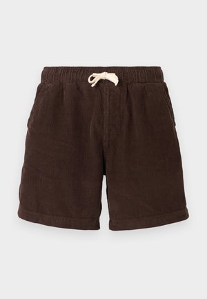 Brown corduroy shorts with an elastic waistband, drawstring closure, and side pockets. The fabric features vertical ribbing and a textured finish.